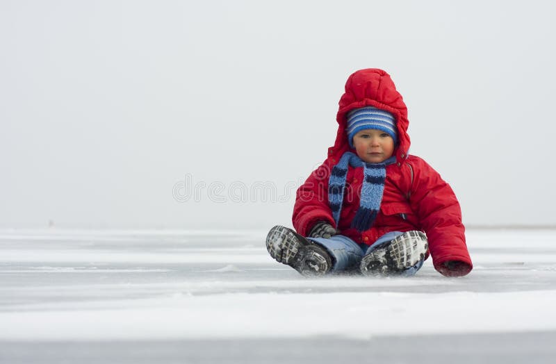 Little boy on ice stock image. Image of winter, frozen 33416541