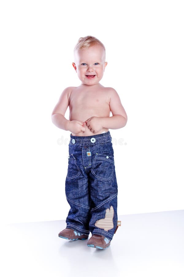 Little Boy in jeans on white