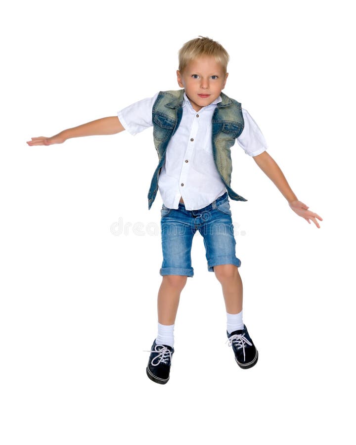 Little boy jumping stock photo. Image of face, action - 133072098