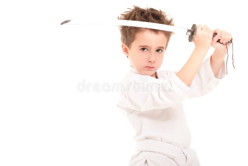 Little boy in kimono with sword