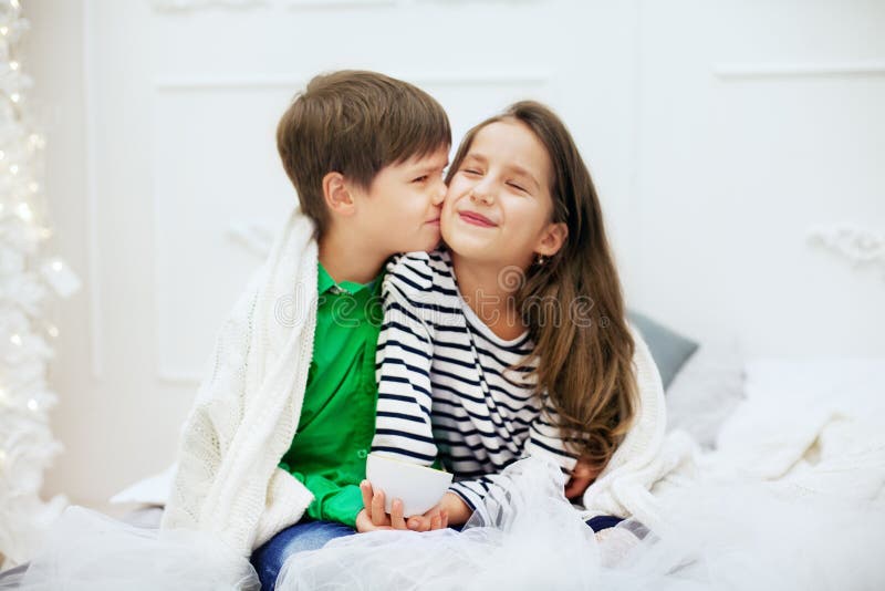 Little Boy Kissing Girlfriend