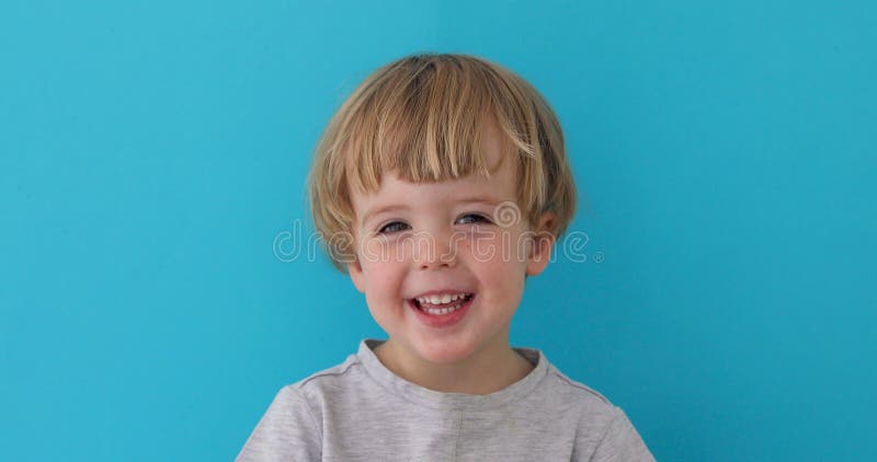 Little boy laughing at camera royalty free stock images Little boy laughing at camera royalty free stock images