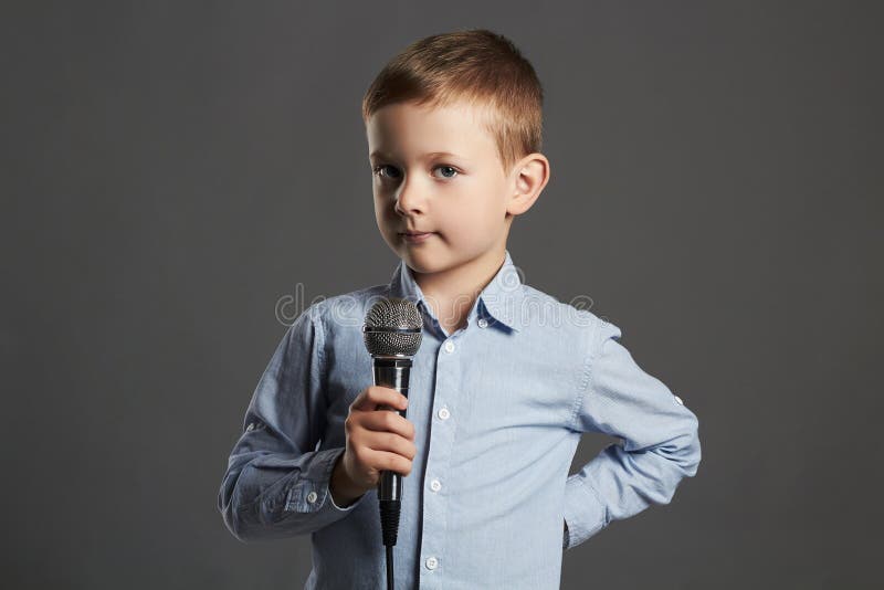 Little Boy Singing in Microphone.child in Karaoke Stock Photo Image