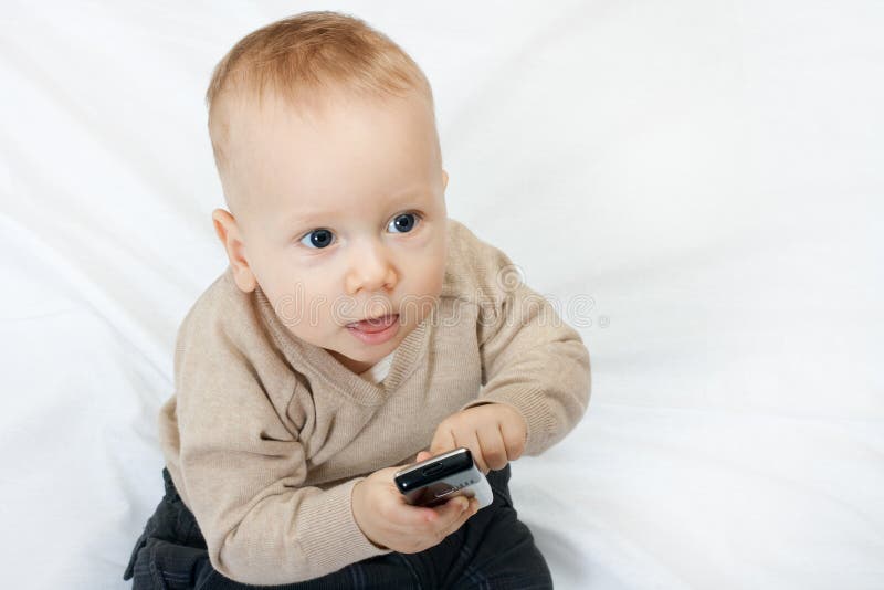 Little Boy with Mobile Phone Stock Photo Image of looking, equipment