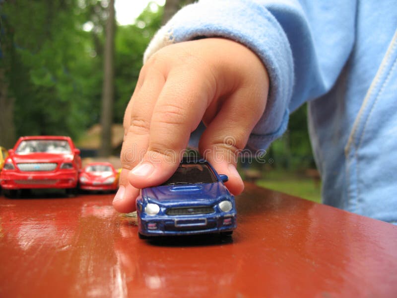 Little boy play with toy-car