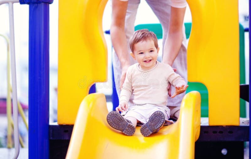 Little boy at a playground stock photos Little boy at a playground stock photos