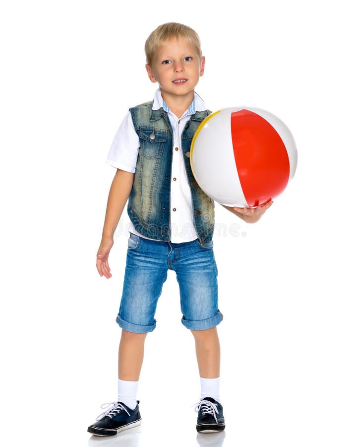 A Little Boy is Playing with a Ball. Stock Image - Image of players ...