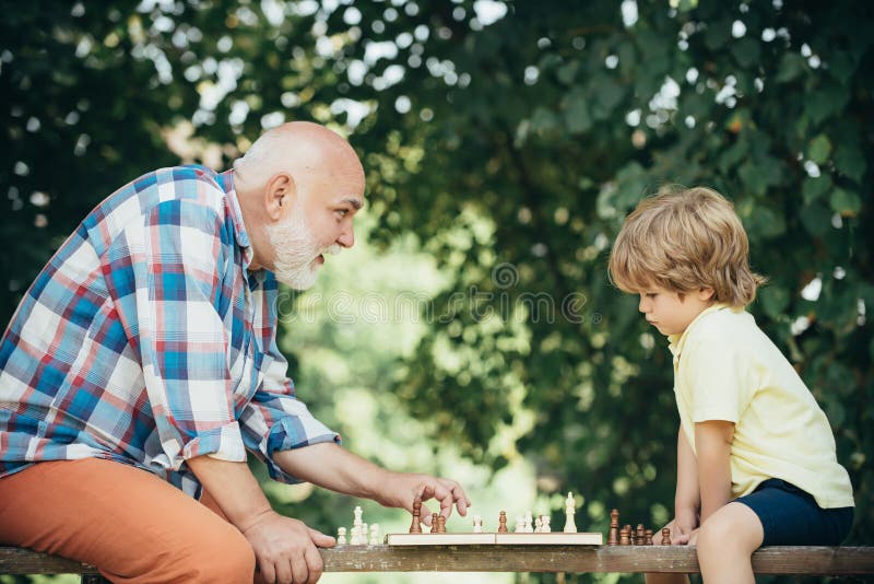 Senior man thinking about his next move in a game of chess Stock Photo by  dmytros9