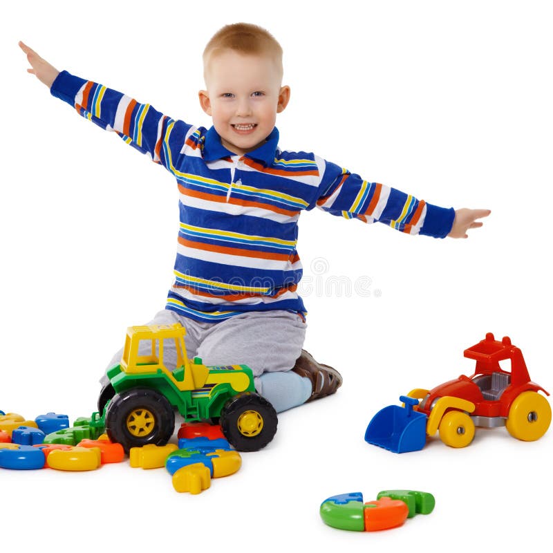 Little Boy Playing with Color Toys on Floor Stock Photo - Image of  bulldozer, little: 19039326