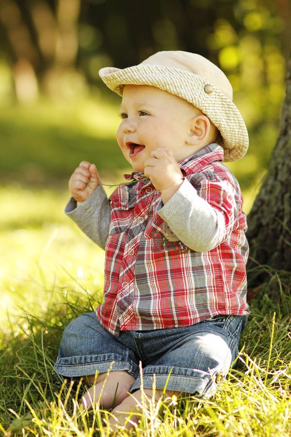 Little Boy Playing Cowboy in Nature Stock Photo Image of equipment