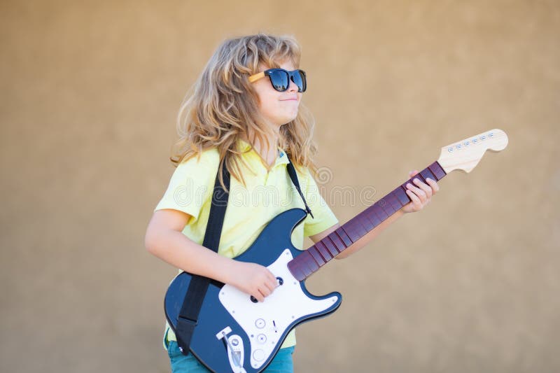 Chick plays Guitar Hero in a belt