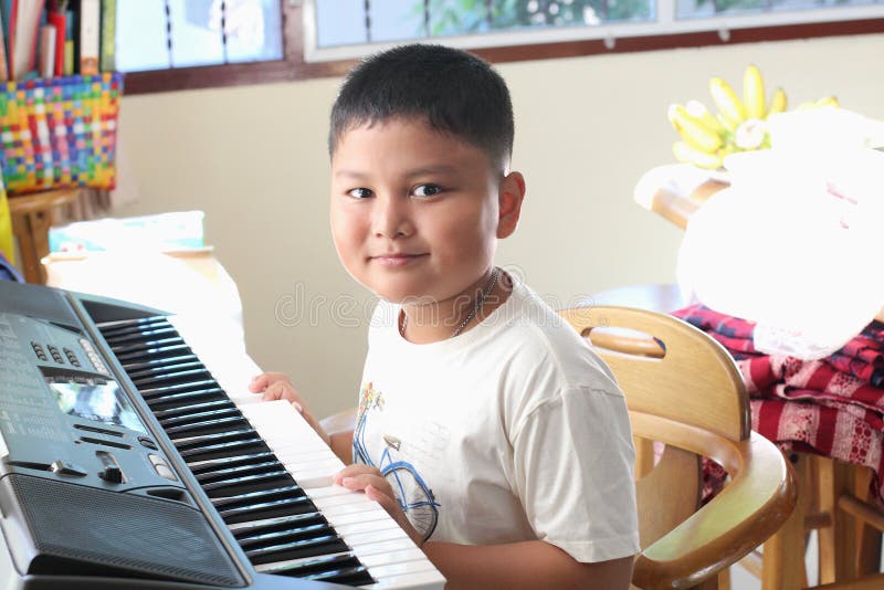 187 Hands Little Boy Piano Keys Stock Photos Free & RoyaltyFree Stock Photos from Dreamstime