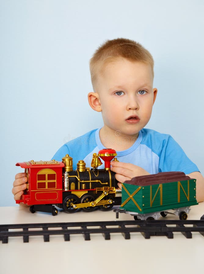 Little Boy Playing with Color Toys on Floor Stock Photo - Image of  bulldozer, little: 19039326