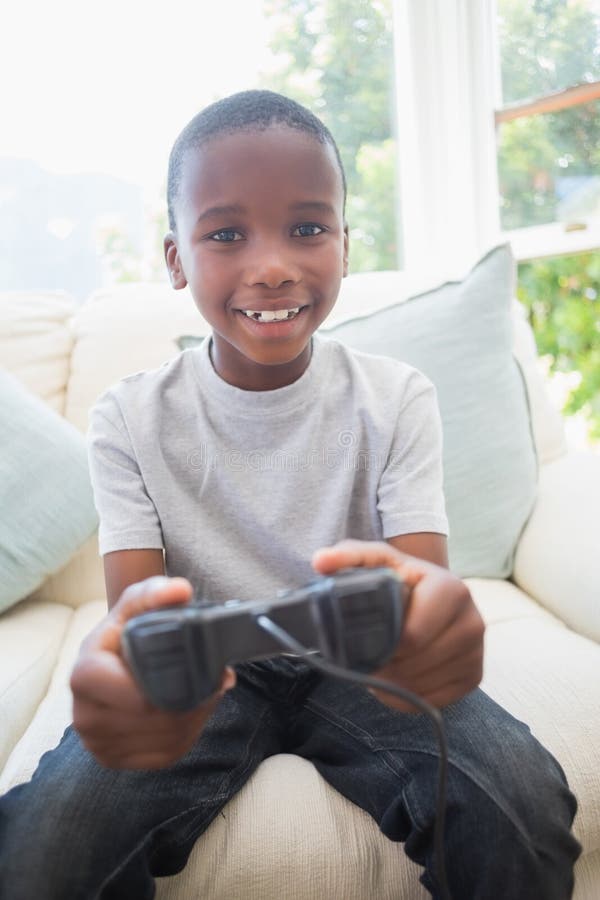 Smiling African Boy Playing Online Games in Class Stock Photo - Image of  phone, modern: 177228872