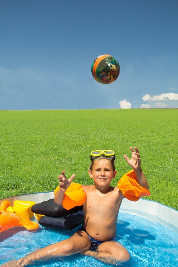 Little boy in the pool stock photo. Image of lifestyles 43057470