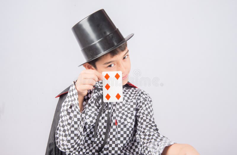 Little boy pretend as a magician performance with fun