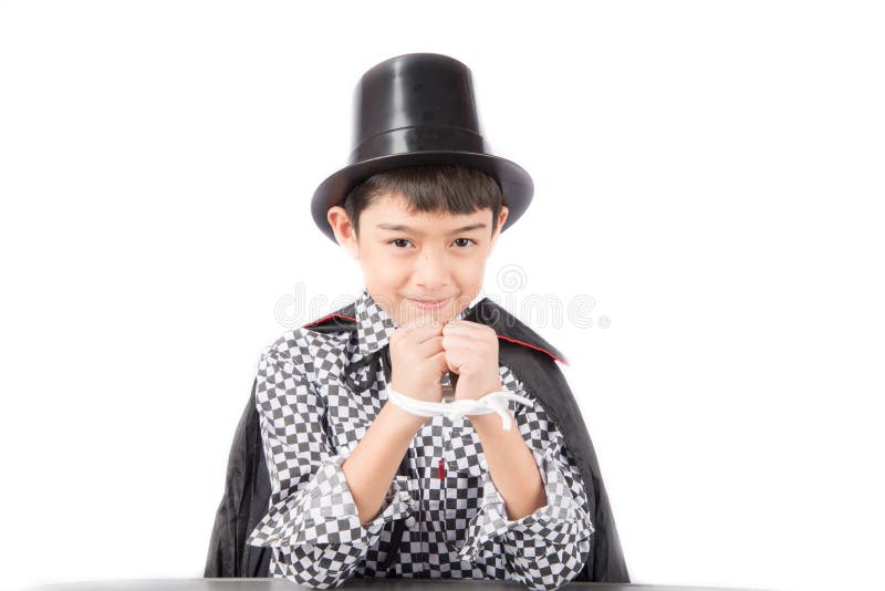 Little boy pretend as a magician performance with fun