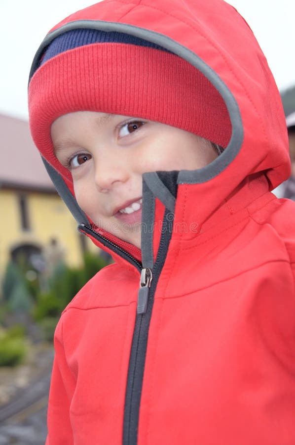 Little Boy in Red Rain Jacket Stock Photo Image of human, jacket