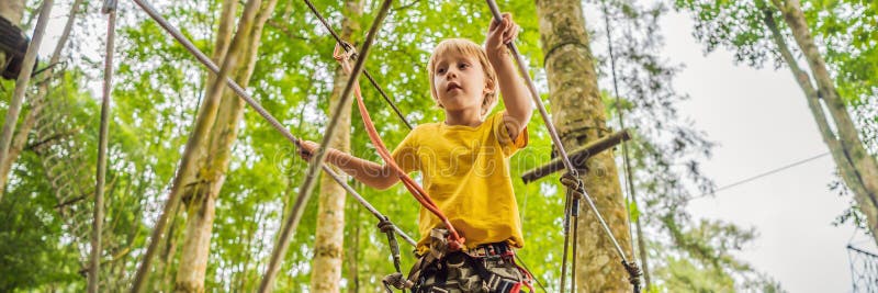 Little Boy in a Rope Park. Active Physical Recreation of the Child in ...