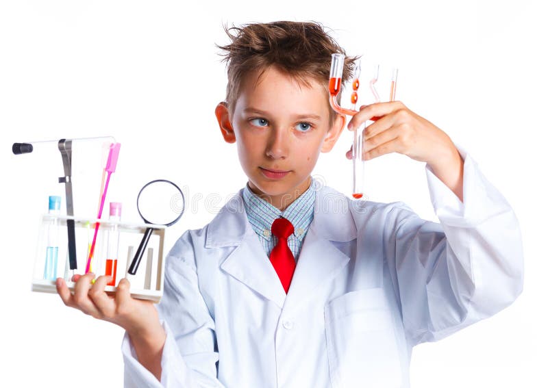 Little boy scientist in the laboratory with microscope and test tubes. Educational concept. Little boy scientist in the laboratory with microscope and test tubes. Educational concept.