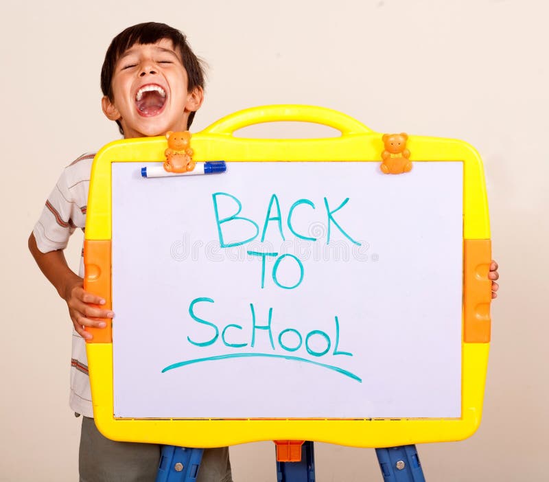 Little boy screaming with a whitebaord stock image