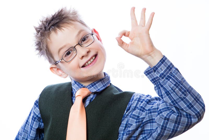 Little boy showing Ok sign