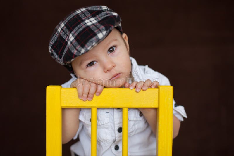 Little Boy, Sitting on a Chair Stock Image Image of studio, nice 36963927
