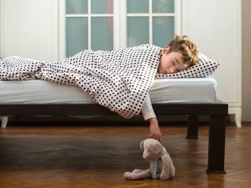 Little boy sleeping in bed royalty free stock image Little boy sleeping in bed royalty free stock image