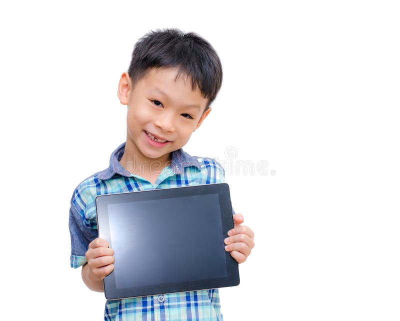 Little boy smiles with tablet computer