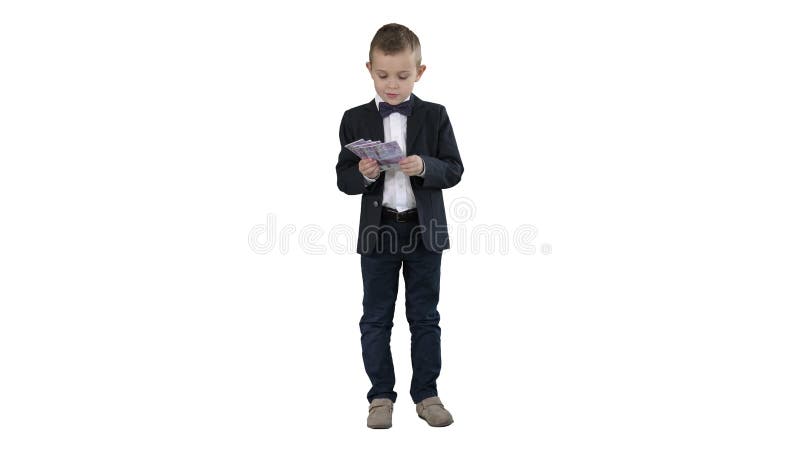 Little boy in a suit counting money on white background.