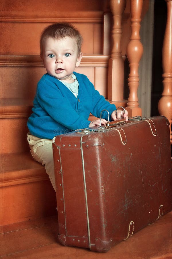 Little boy and suitcase stock photo. Image of holding 48202474