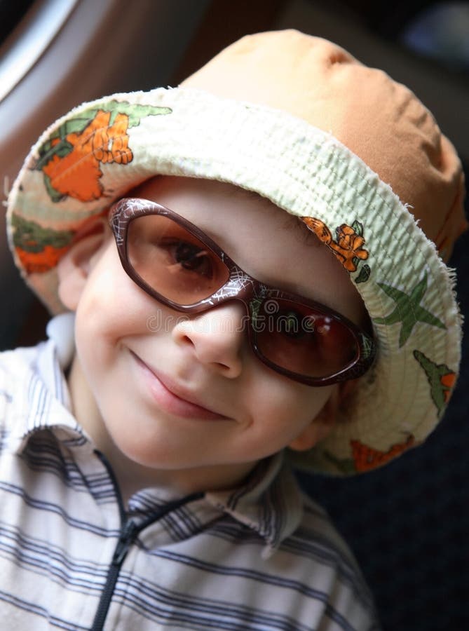 Little Boy with Sunglasses and Hat Stock Photo Image of curiosity