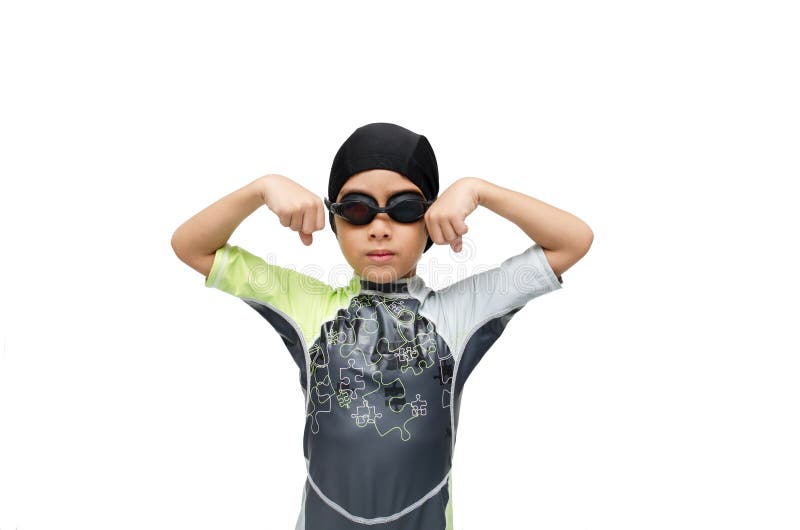 Little boy in swimming goggles on white background