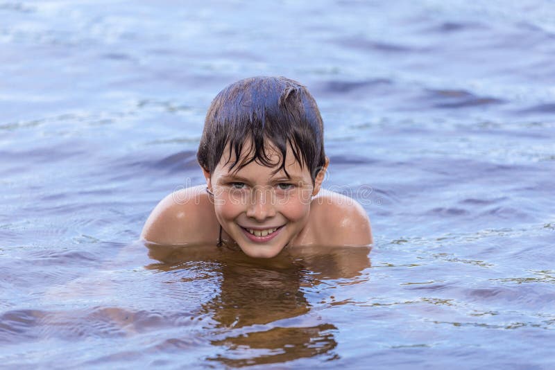 Little Boy Swimming in a Lake Stock Image Image of relaxation, play