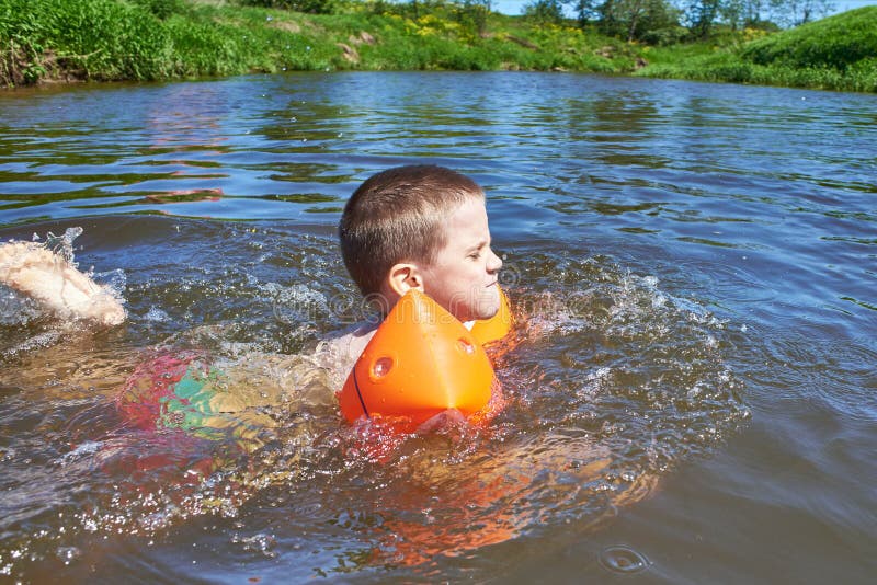 Little Boy Swimming in River Stock Image Image of swim, blue 72551091