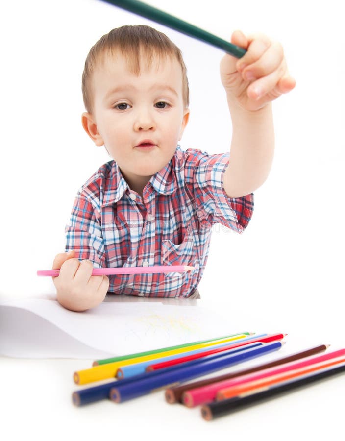 A Little Boy at the Table Draws Stock Image Image of painter, small