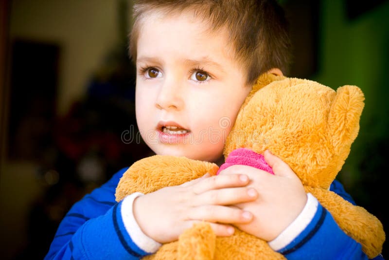 Little boy with teddy bear