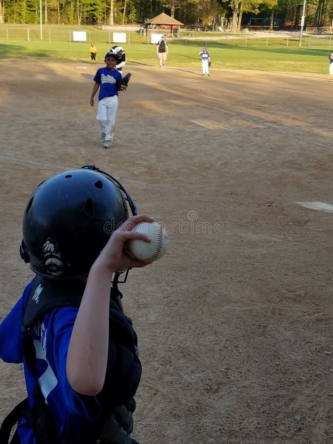 Boy throwing baseball stock image. Image of summer, casual 60406747