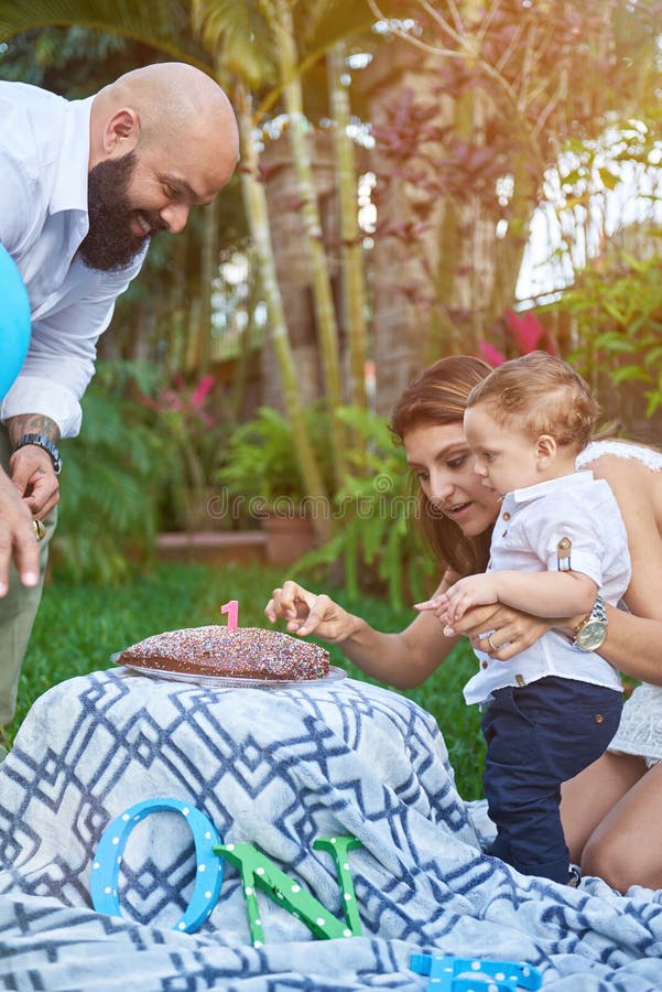 Little boy trying sweet cake stock images Little boy trying sweet cake stock images
