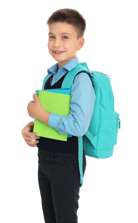 Little Boy in Uniform with School Stationery on Background Stock Image