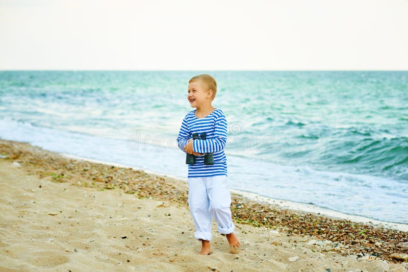 The Little Boy in the Vest Against the Sea Stock Photo Image of