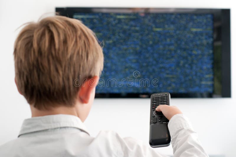 Little Boy watching TV stock photo. Image of flat, screen 20727348