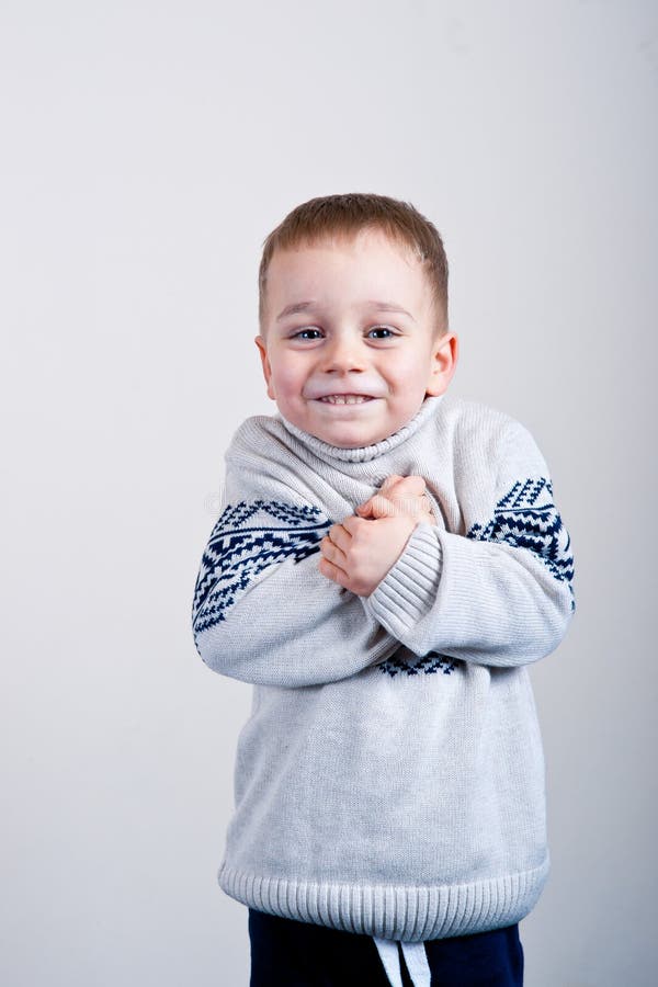 Little boy stock photo. Image of sweater, white, preschooler 64891874