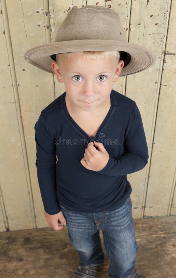 Little boy wiht cowboy hat stock image. Image of farmer 26469781