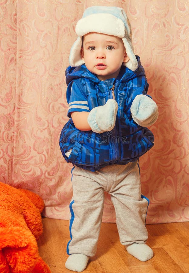 A little boy in winter hat stock photo. Image of small - 37711684