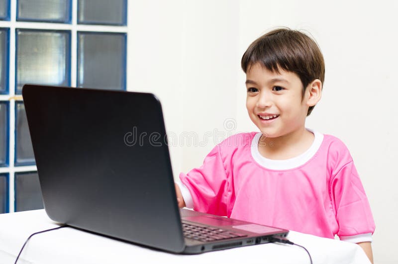 Little boys use laptop for education royalty free stock image