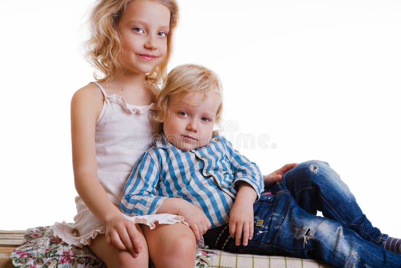 Little Brother And Sister Playing Together In A Room Stock Image 