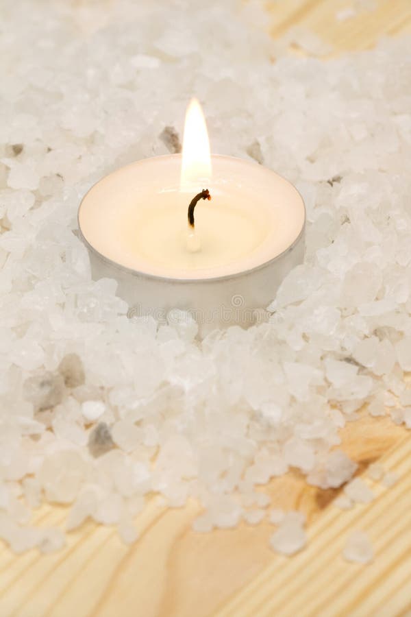 Little Candle in Bath Salt stock image. Image of light 12009385
