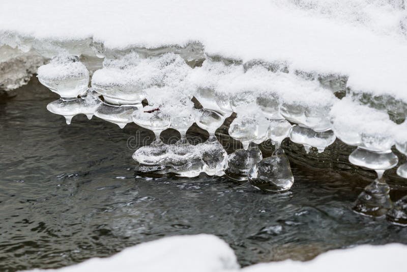 Little cascade with ice and icicles