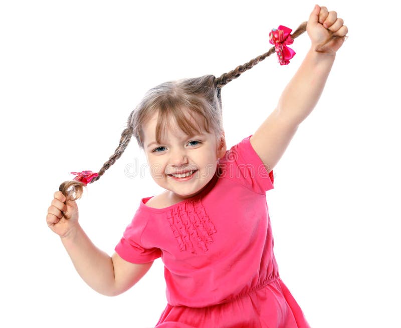 Little cheerful girl holding hair